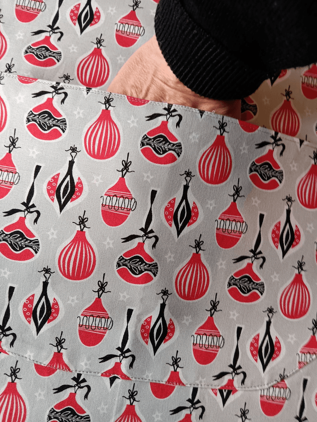 Kitchen Apron Cotton Baubles Print Fabric with Grey Lining and straps. Adjustable neck tie, lined matching pocket
