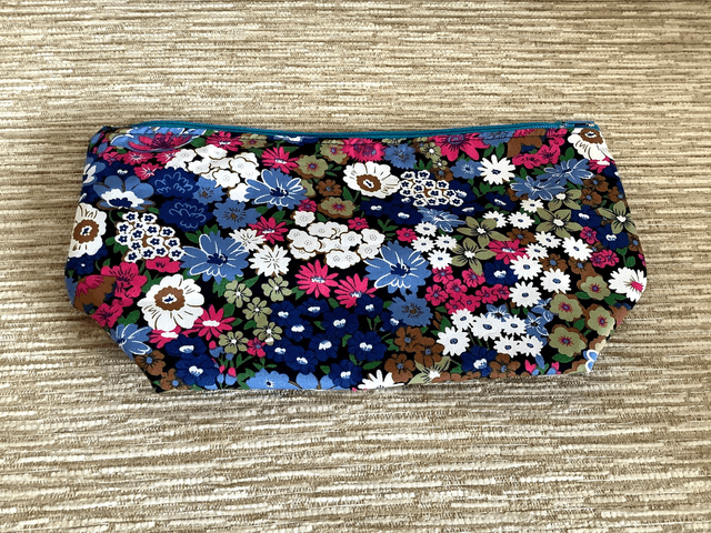 Box Cosmetic Wash Bag with Zip Closure and waterproof lining.