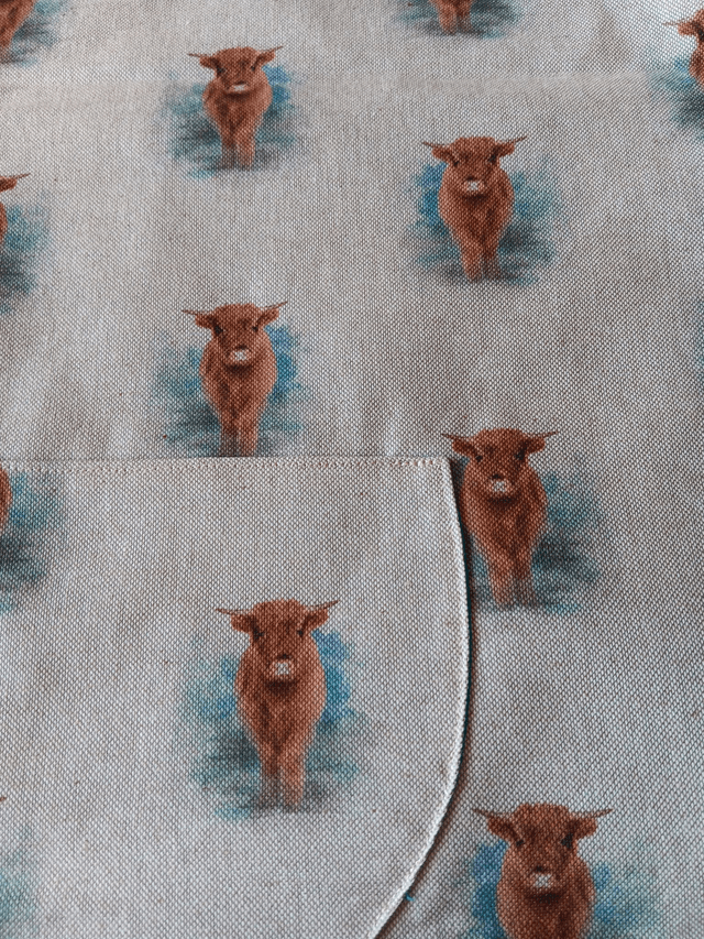 Adult Kitchen Apron Highland Cows(Coos) Patterned Cotton Fabric with Front pocket and turquoise lining, waist ties and adjustible neck ties