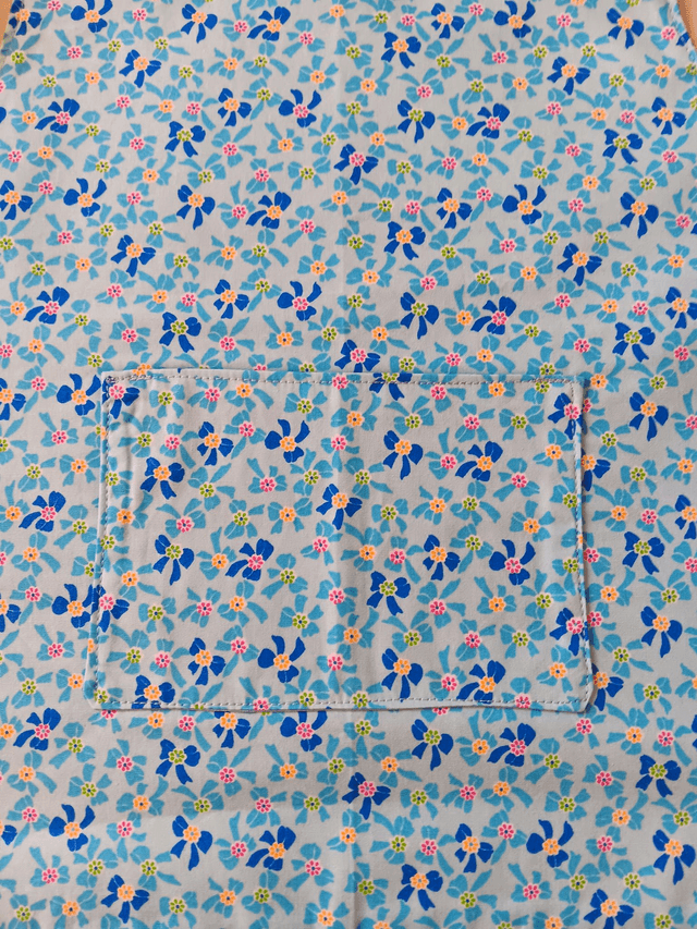 Childs Kitchen/Play Apron  Blue Bows Cotton Fabric with Front pocket and pale blue lining, waist ties and adjustable neck tie