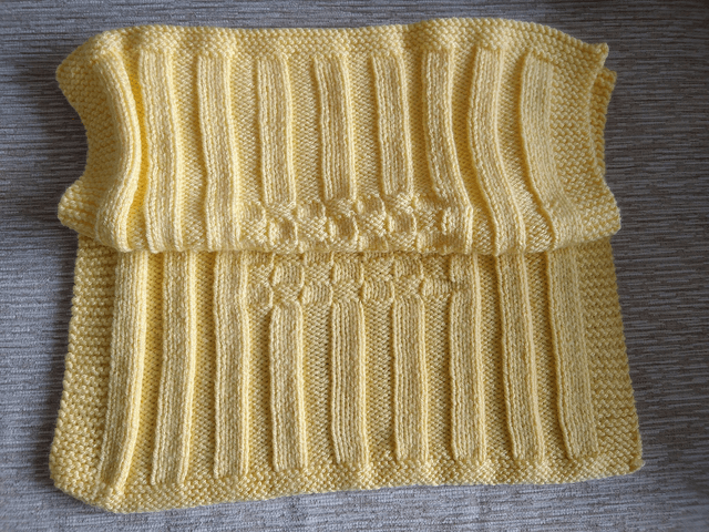 Hand Knitted Blanket in Lemon Baby soft Chunky yarn with basket weave and rib pattern