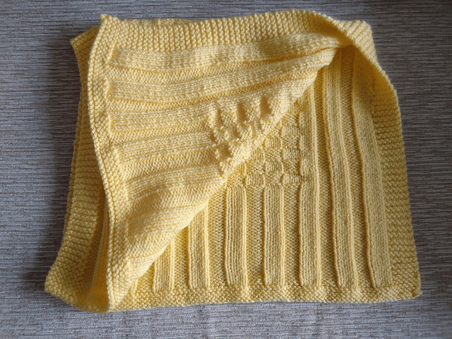 Hand Knitted Blanket in Lemon Baby soft Chunky yarn with basket weave and rib pattern