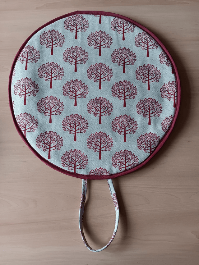 Pair of Beige Aga Lid Covers with Red Mulberry Trees Print Fabric and Burgundy binding