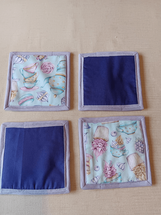Set of 4 Coasters Three Wishes Tea and Cake patterned cotton fabric
