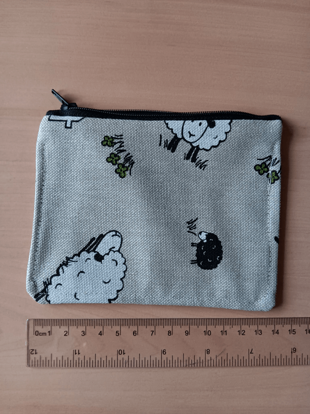 Beige Purse with Sheep Pattern, Grey Waterproof Lining and Black Zip