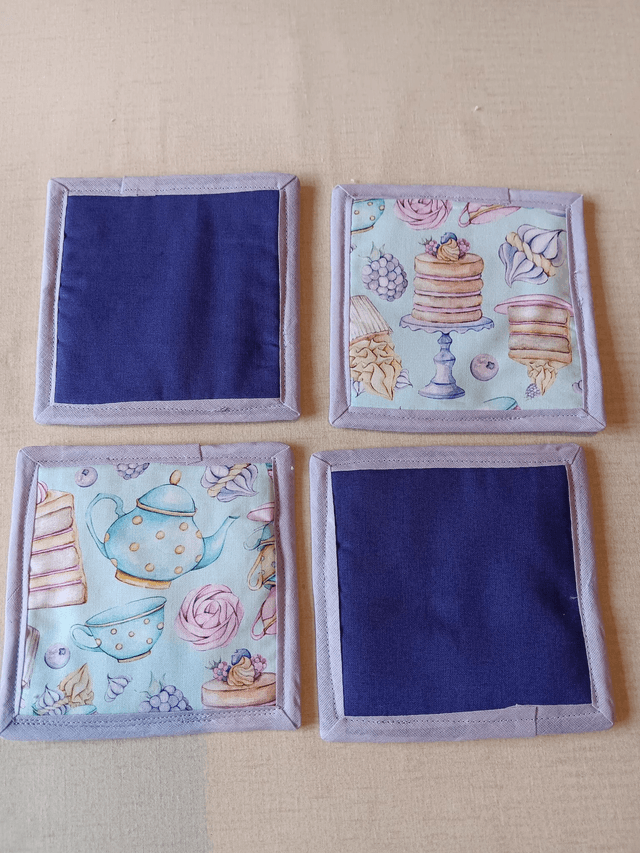 Set of 4 Coasters Three Wishes Tea and Cake patterned cotton fabric