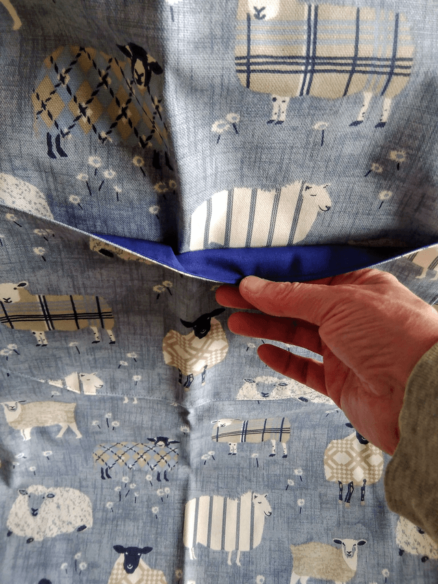Adult Kitchen Apron Baa Baa Denim Sheep Patterned Cotton Fabric with Front pocket and Blue lining, waist ties and adjustible neck ties