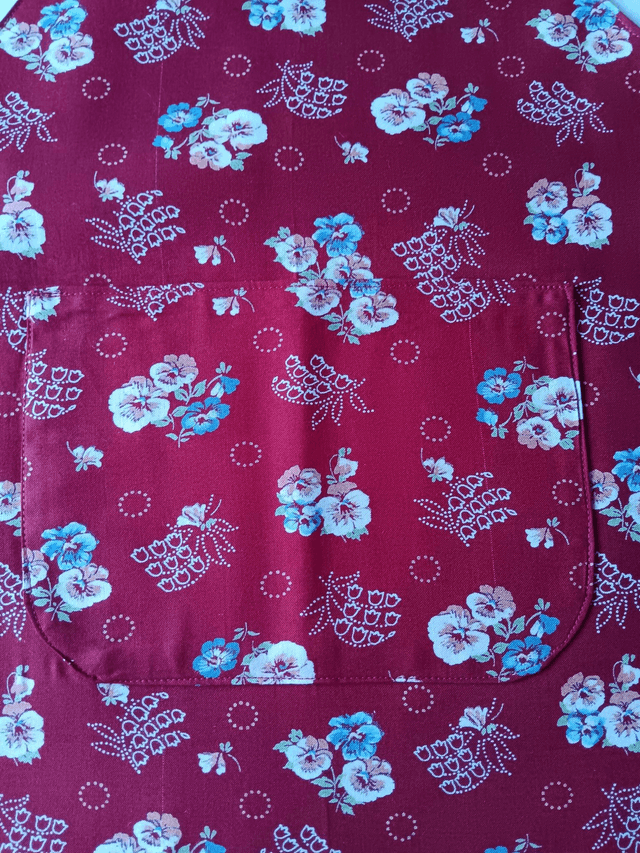 Childs Kitchen Play Apron Burgundy Flower Patterned Cotton Fabric with Front pocket and Burgundy lining, waist ties and adjustable neck ties 