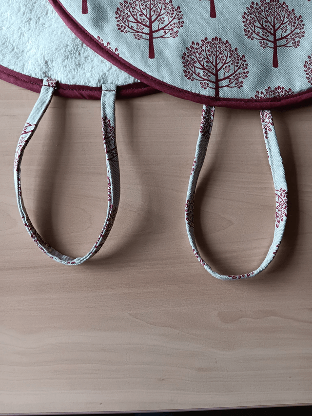 Pair of Beige Aga Lid Covers with Red Mulberry Trees Print Fabric and Burgundy binding