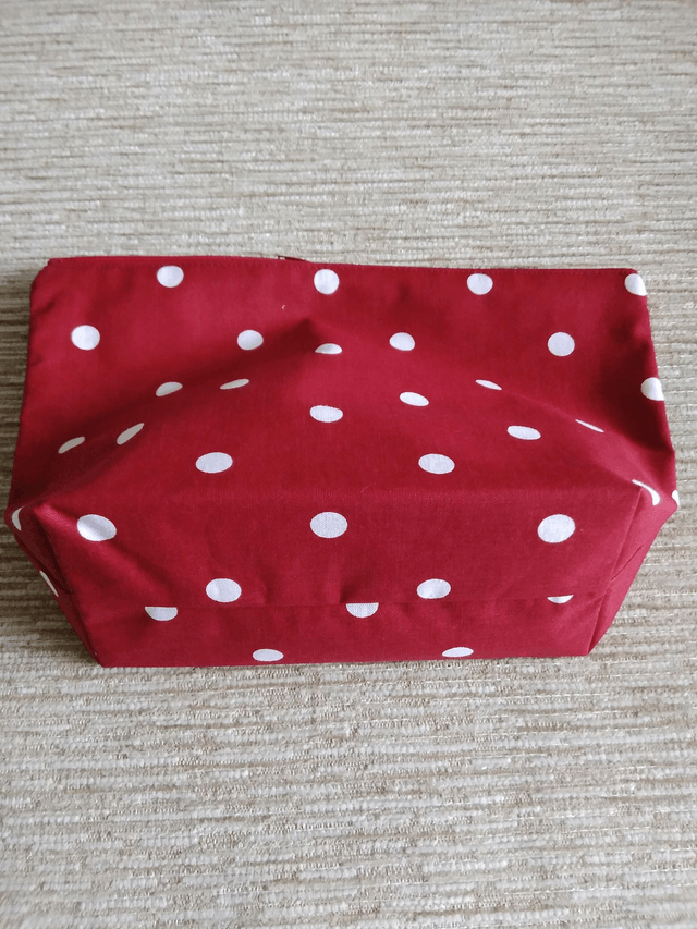 Cosmetic Toiletry Wash Bag in Red with White spots cotton fabric with red PU waterproof lining and Zip Closure.