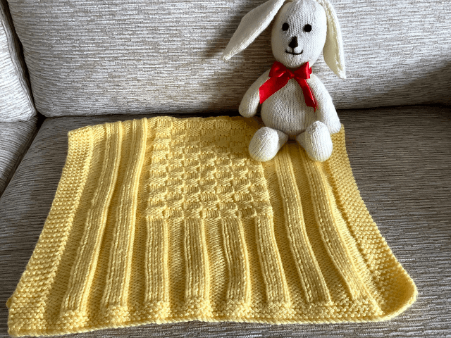 Hand Knitted Blanket in Lemon Baby soft Chunky yarn with basket weave and rib pattern