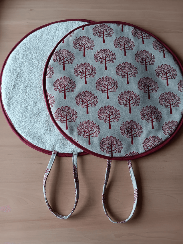Pair of Beige Aga Lid Covers with Red Mulberry Trees Print Fabric and Burgundy binding