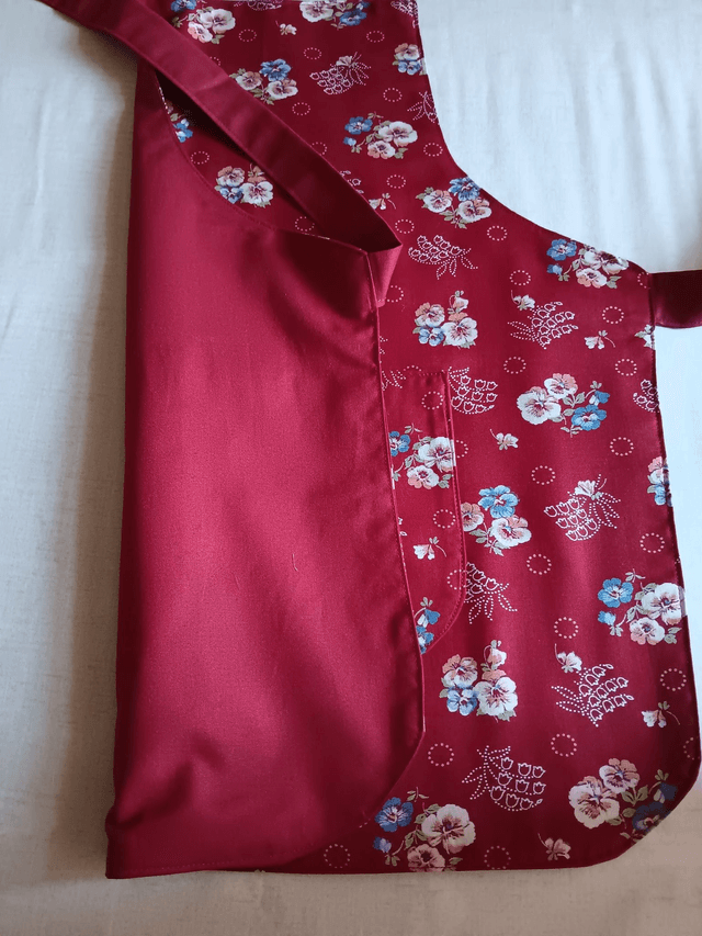 Childs Kitchen Play Apron Burgundy Flower Patterned Cotton Fabric with Front pocket and Burgundy lining, waist ties and adjustable neck ties 