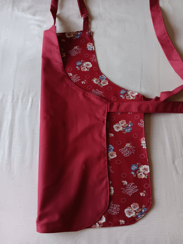 Childs Kitchen Play Apron Burgundy Flower Patterned Cotton Fabric with Front pocket and Burgundy lining, waist ties and adjustable neck ties 