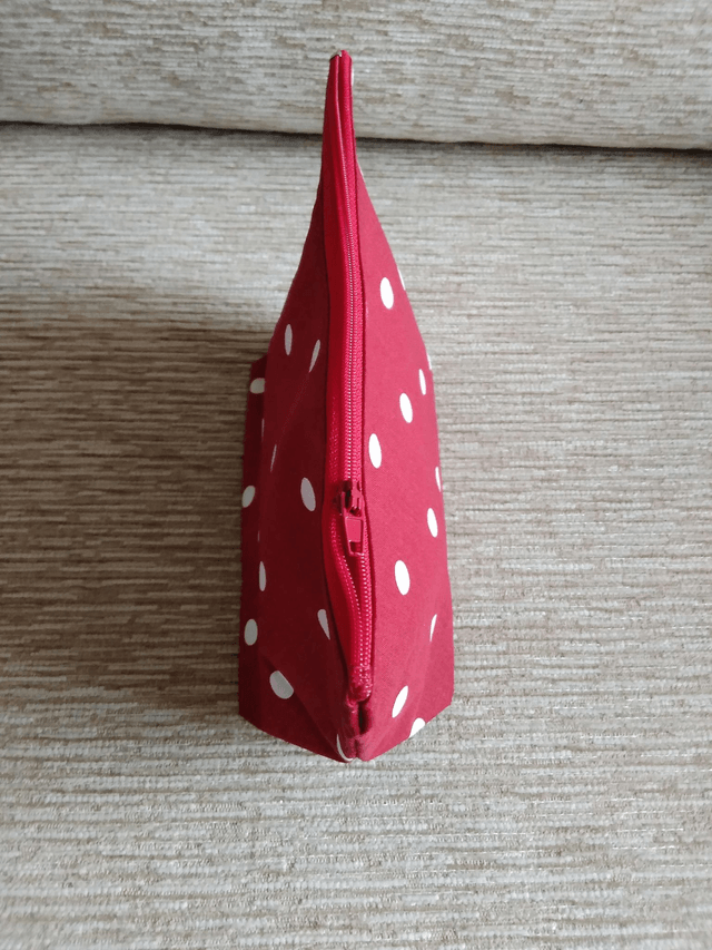 Cosmetic Toiletry Wash Bag in Red with White spots cotton fabric with red PU waterproof lining and Zip Closure.