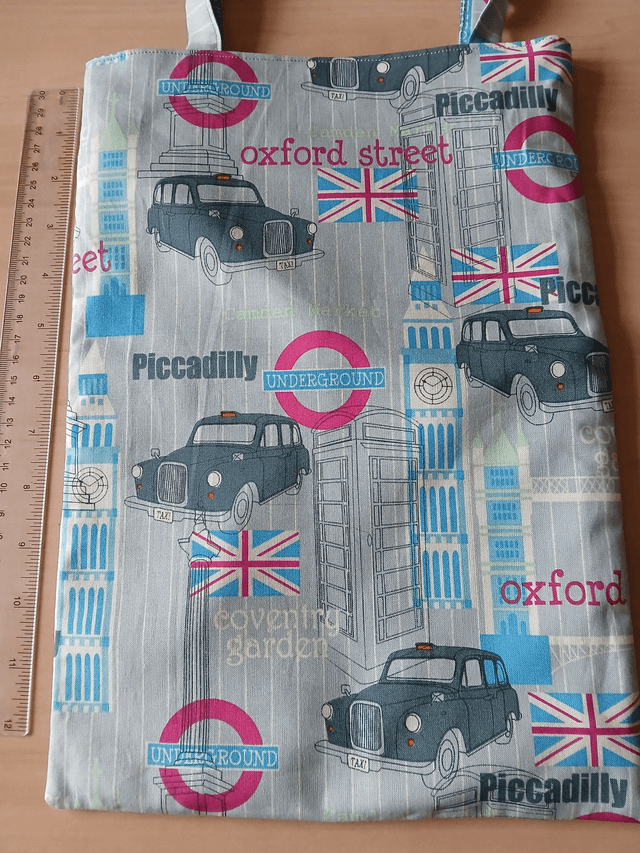 Fully lined Children's Tote/Toy bag Vehicle Print Cotton Fabric with synthetic fabric lining.