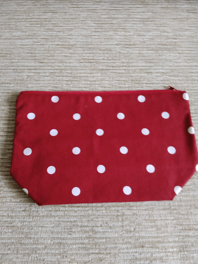 Cosmetic Toiletry Wash Bag in Red with White spots cotton fabric with red PU waterproof lining and Zip Closure.