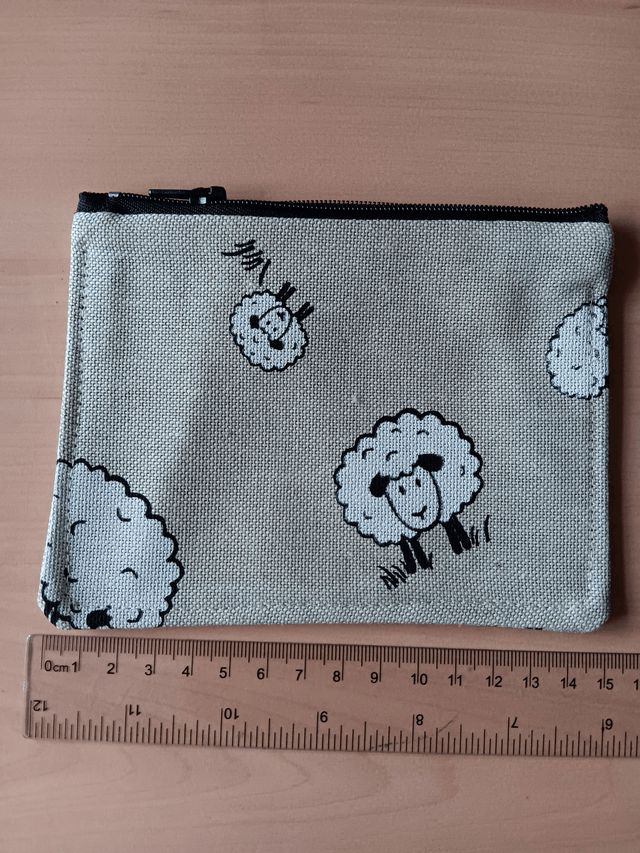 Beige Purse with Sheep Pattern, Grey Waterproof Lining and Black Zip