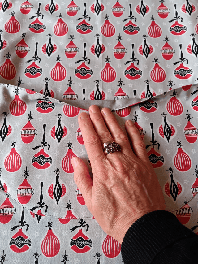 Kitchen Apron Cotton Baubles Print Fabric with Grey Lining and straps. Adjustable neck tie, lined matching pocket