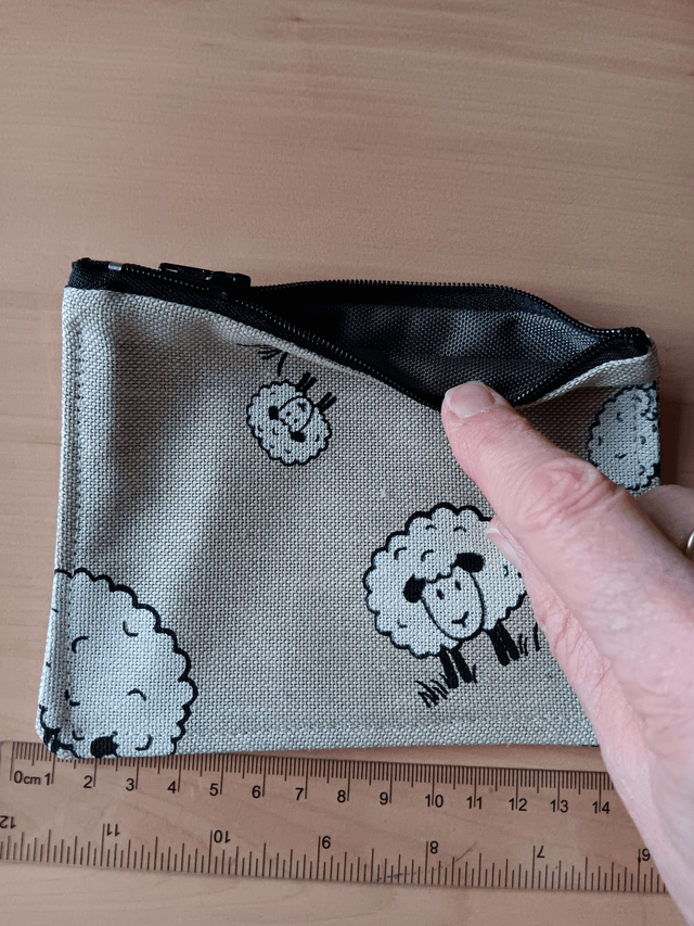 Beige Purse with Sheep Pattern, Grey Waterproof Lining and Black Zip