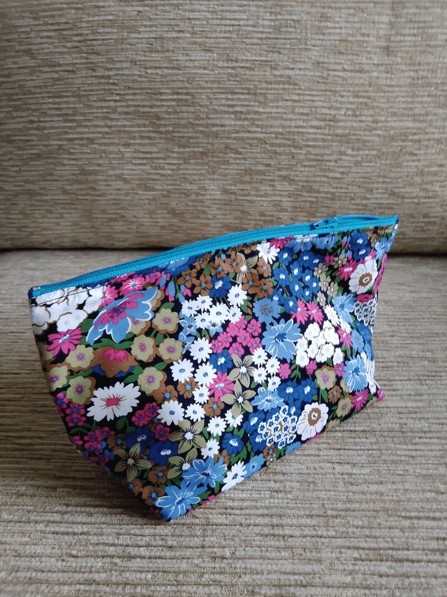 Box Cosmetic Wash Bag with Zip Closure and waterproof lining.