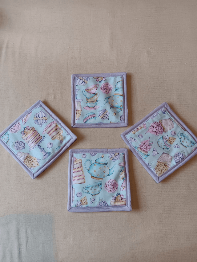 Set of 4 Coasters Three Wishes Tea and Cake patterned cotton fabric
