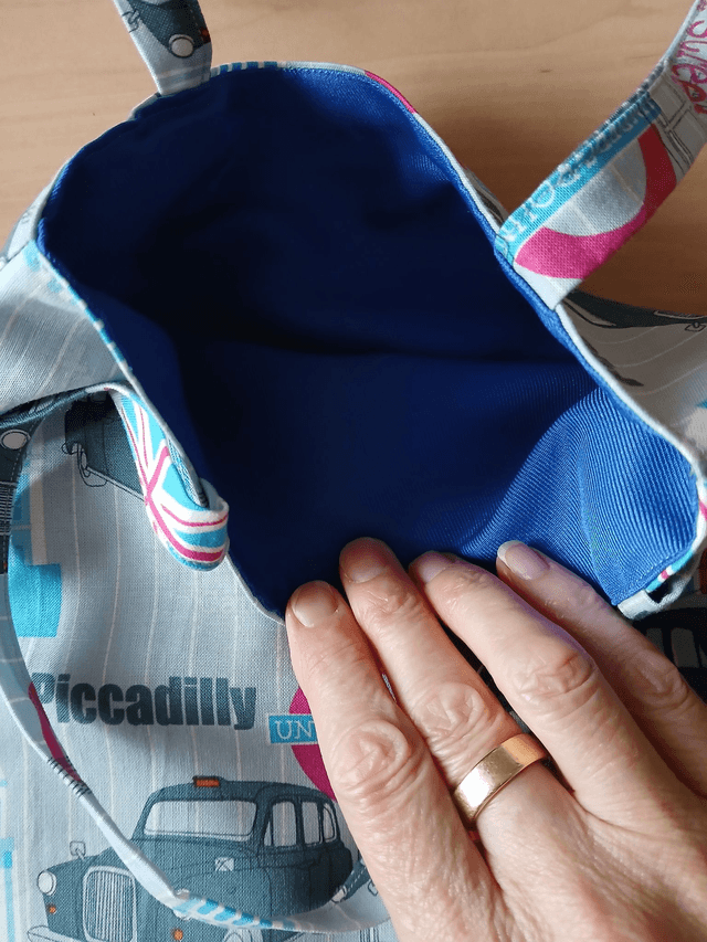 Fully lined Children's Tote/Toy bag Vehicle Print Cotton Fabric with synthetic fabric lining.