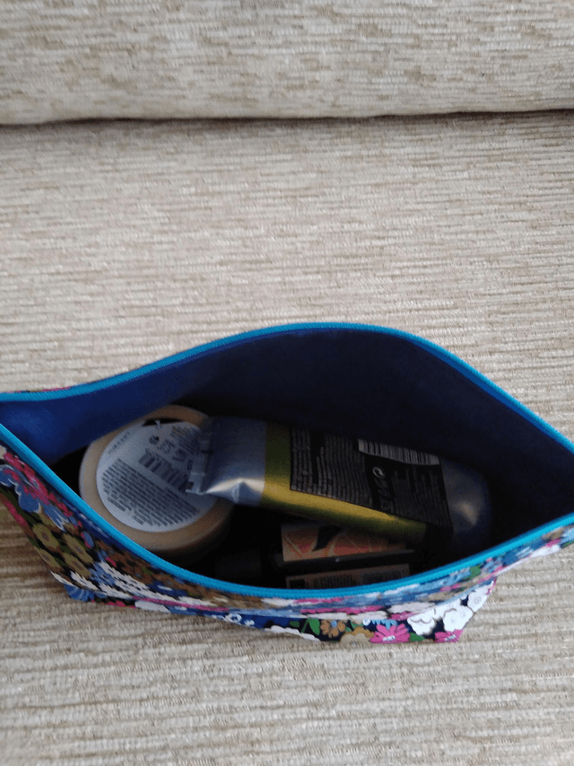 Box Cosmetic Wash Bag with Zip Closure and waterproof lining.