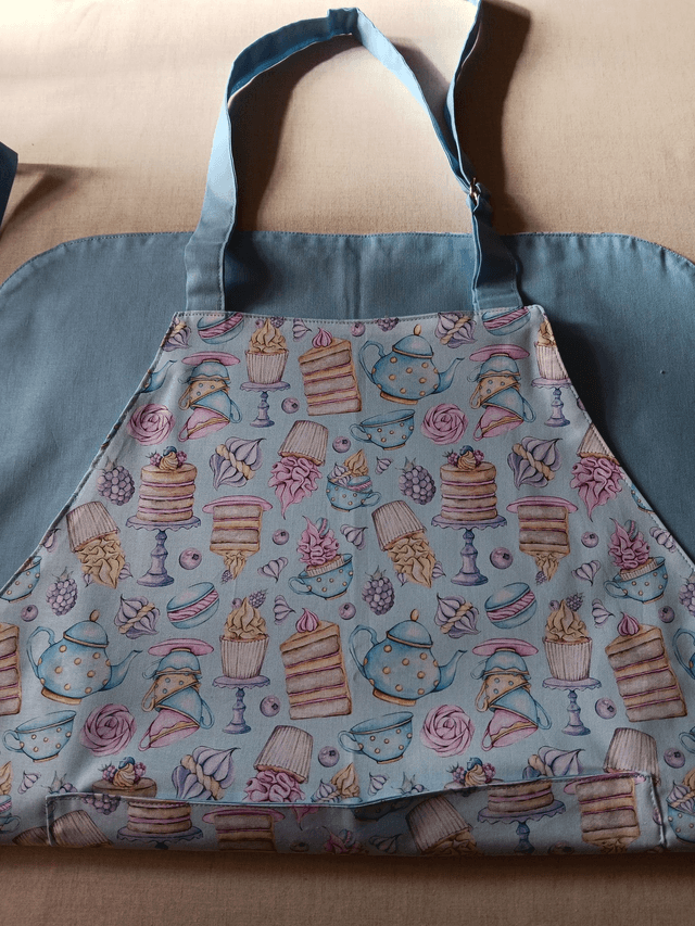 Adult Kitchen Apron Tea and Cakes Patterned Cotton Fabric with Front pocket and Pale blue lining, waist ties and adjustable neck ties