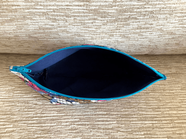 Box Cosmetic Wash Bag with Zip Closure and waterproof lining.