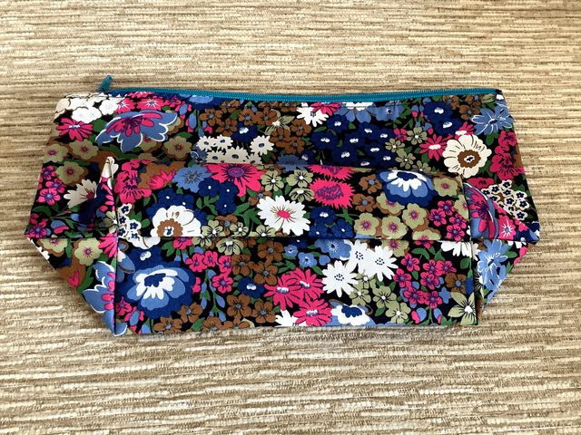 Box Cosmetic Wash Bag with Zip Closure and waterproof lining.