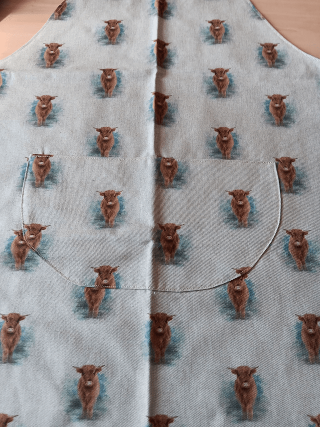 Adult Kitchen Apron Highland Cows(Coos) Patterned Cotton Fabric with Front pocket and turquoise lining, waist ties and adjustible neck ties
