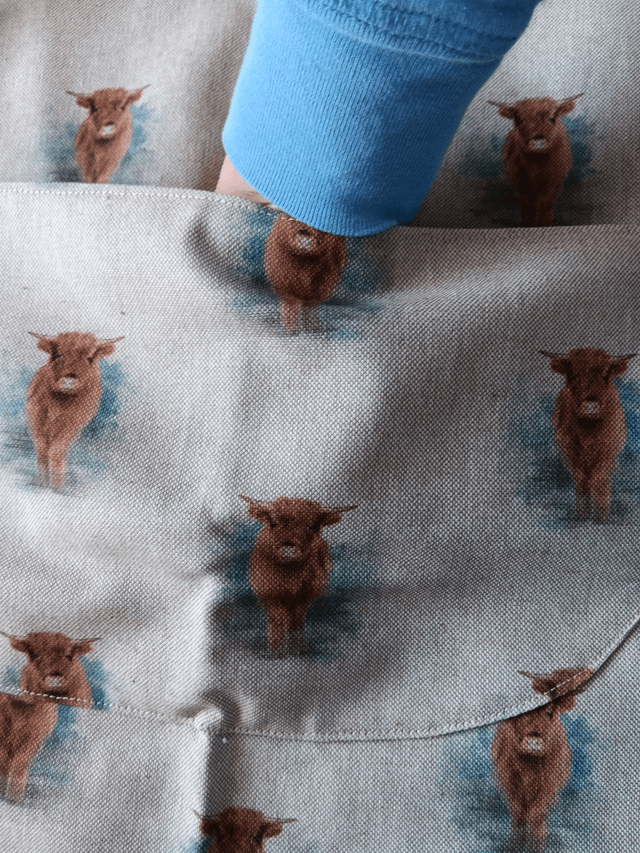 Adult Kitchen Apron Highland Cows(Coos) Patterned Cotton Fabric with Front pocket and turquoise lining, waist ties and adjustible neck ties