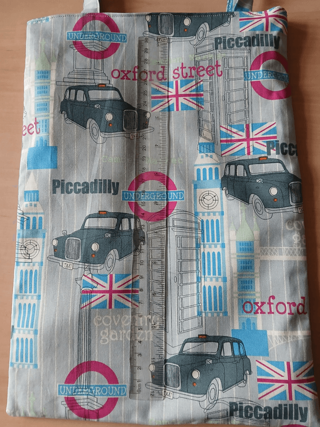 Fully lined Children's Tote/Toy bag Vehicle Print Cotton Fabric with synthetic fabric lining.
