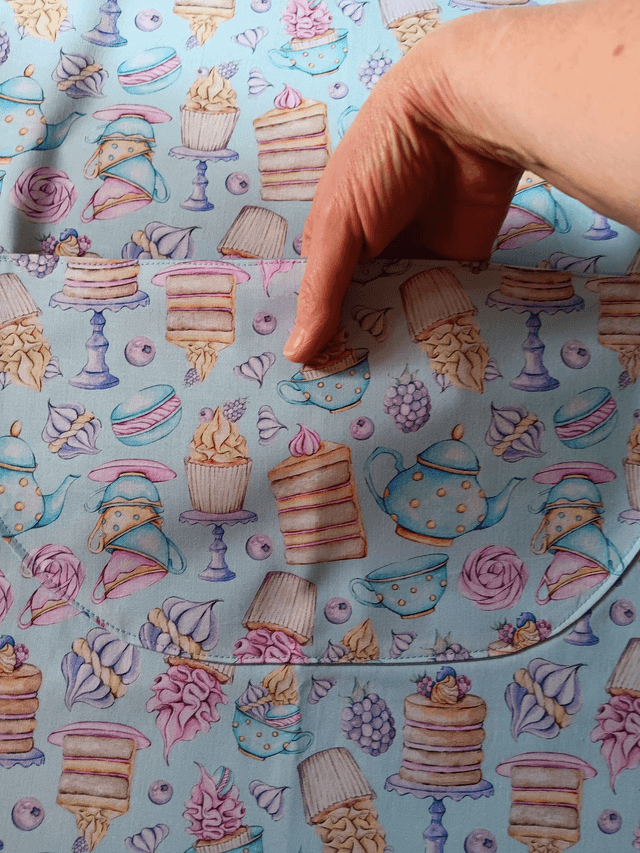 Adult Kitchen Apron Tea and Cakes Patterned Cotton Fabric with Front pocket and Pale blue lining, waist ties and adjustable neck ties